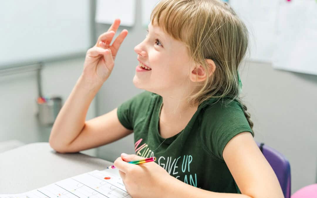 Girl working on handwriting assignment